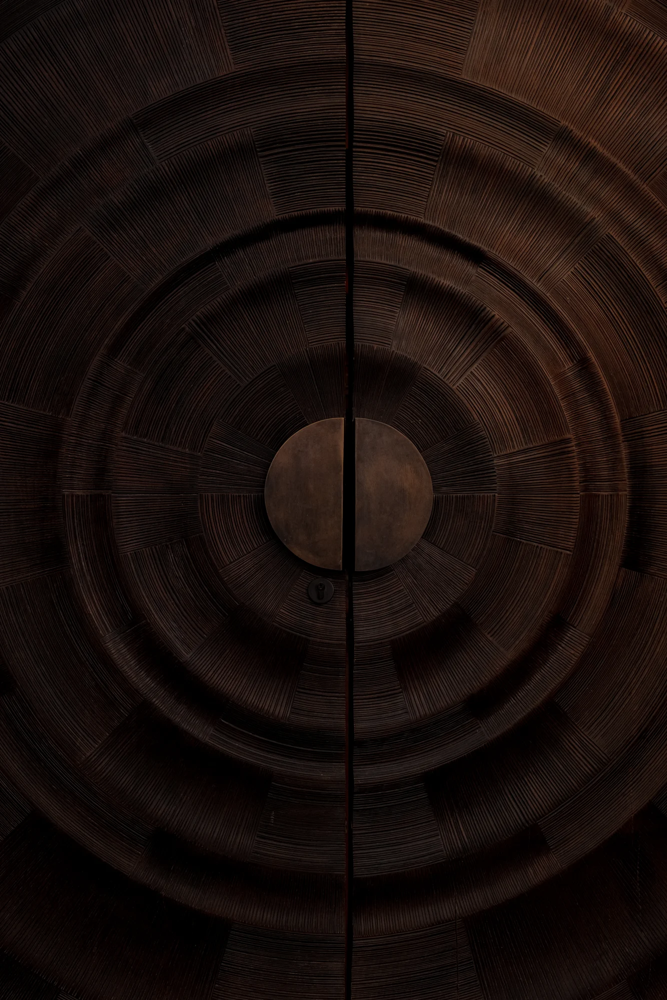 The sculptural wooden entrance to House of Kairos.